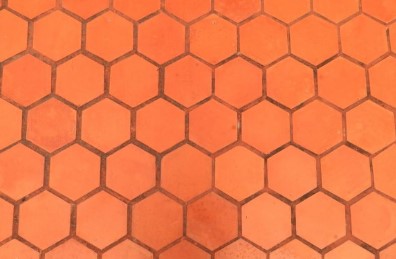 Hexagonal orange-red stamped pattern