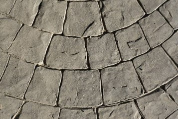 Stamped cobblestone wave pattern